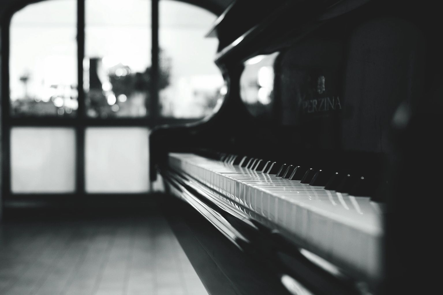 A piano by the window